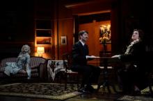 Actor Eric Damon Smith (as Charles) enlists Laurie Birmingham (right, as the madcap medium Madame Arcati) to exorcise his ghost, Shanara Gabrielle (left, as deceased first wife, Elvira)