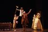 Bob Cratchit (actor J. Todd Adams) lifts Tiny Tim (actor Catcher Sawyer) as Cratchit family members celebrate the occasion in Great Lakes Theater's 25th anniversary production of Charles Dickens' holiday classic "A Christmas Carol" at the Ohio Theatre, PlayhouseSquare. (Photography by Roger Mastroianni)